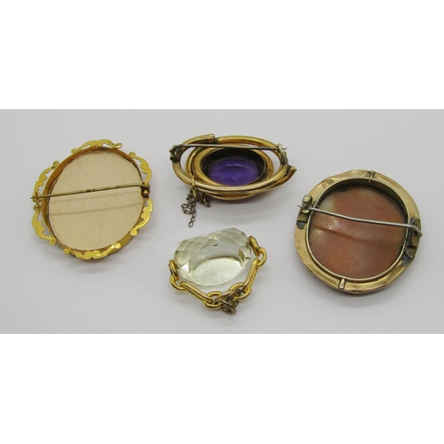 318 - Group of antique yellow metal jewellery comprising a 9ct brooch with scrolled frame, a citrine swive... 