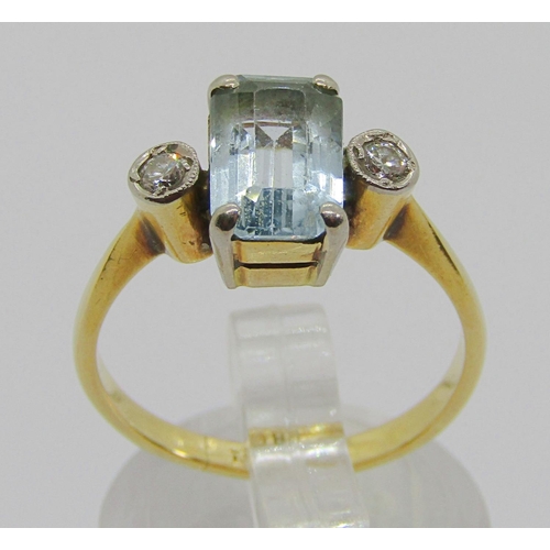 325 - Early 20th century 18ct emerald-cut aquamarine and diamond three stone ring, size J, 3.4g