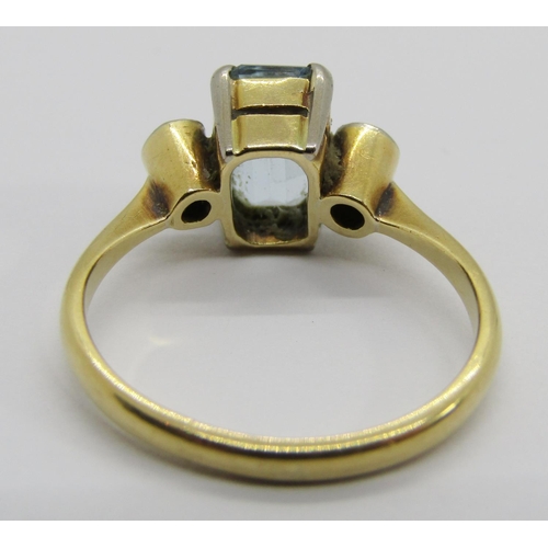 325 - Early 20th century 18ct emerald-cut aquamarine and diamond three stone ring, size J, 3.4g