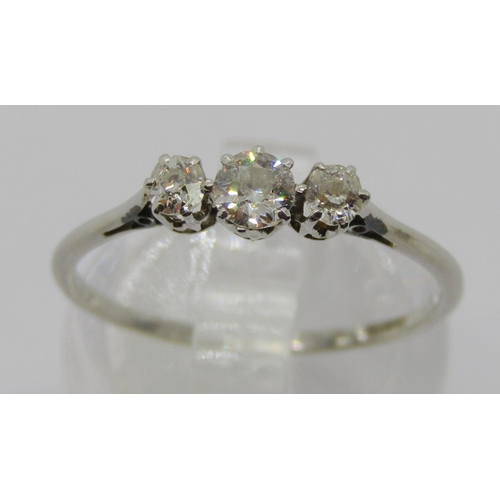 327 - Early 20th century three stone diamond ring in white metal, mark worn - either platinum or 18ct whit... 