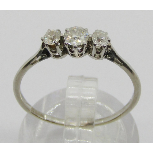 327 - Early 20th century three stone diamond ring in white metal, mark worn - either platinum or 18ct whit... 