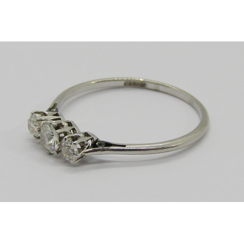 327 - Early 20th century three stone diamond ring in white metal, mark worn - either platinum or 18ct whit... 