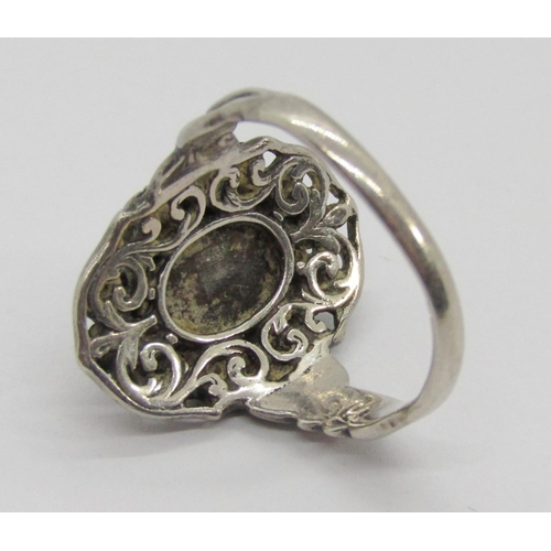 333 - Arts & Crafts style silver openwork dress ring set with a cabochon opal, size P and a Bohemian garne... 