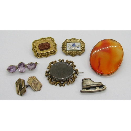 337 - Group of antique brooches comprising a Victorian yellow metal mourning brooch containing woven hair,... 