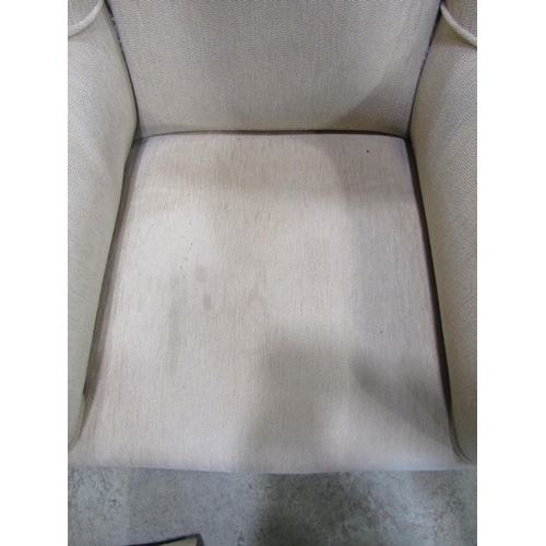 1272 - An Edwardian wing chair with arched back raised on simple chamfered supports together with An Edward... 