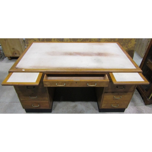 1214 - A Mid 20th century kneehole desk with nine drawers and inset leather top, 150cm 93cm, 88cm high