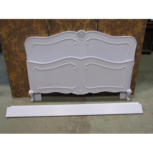 1317 - A continental wooden Bed stead with shaped outline, applied mouldings and later painted finish (comp... 