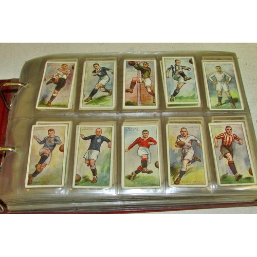 883 - Cigarette card album - containing examples of Players / Wills / Carreras / Churchmans - mostly footb... 