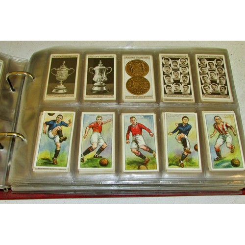 883 - Cigarette card album - containing examples of Players / Wills / Carreras / Churchmans - mostly footb... 