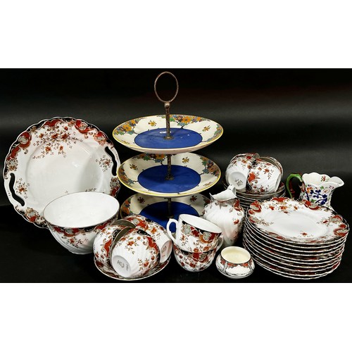 138 - A sandwich set with fish detail, part Royal Winton tea service with floral panelled handle, Austrian... 