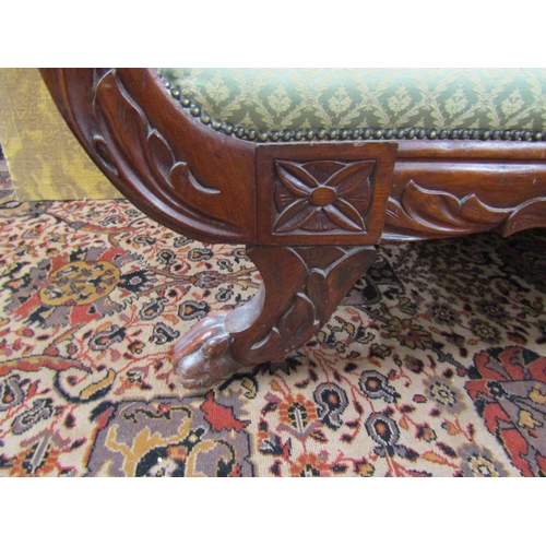 1434 - Small Regency mahogany sabre leg scroll end sofa with carved and moulded outline, re-upholstered fin... 