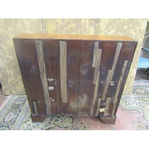 1444 - Georgian yew bureau of four long graduated drawers on bracket supports, the fall flap enclosing a fi... 