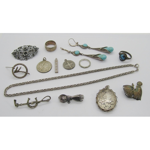 410 - Collection of silver jewellery to include a Candida South Africa brooch depicting a drumming figure,... 