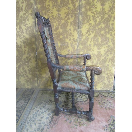 1451 - Carolean carved walnut elbow chair with pierced cresting rail and later upholstered panel