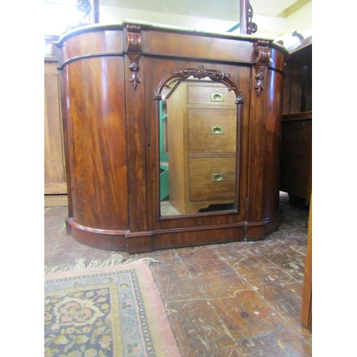 1459 - A Victorian walnut chiffonier with mirror panelled base and raised mirror back and marble top, 120cm... 