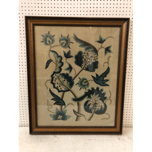 789 - Early 20th century wool embroidery of flowers and leaves, frame size: 72 x 60 cm, glazed and framed