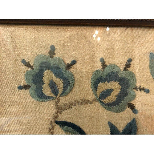 789 - Early 20th century wool embroidery of flowers and leaves, frame size: 72 x 60 cm, glazed and framed