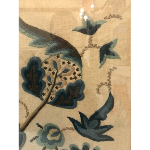 789 - Early 20th century wool embroidery of flowers and leaves, frame size: 72 x 60 cm, glazed and framed