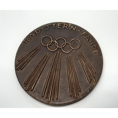 469 - A 1936 Berlin Olympic participants medallion, designed by Otto Placzek, in seemingly original fitted... 