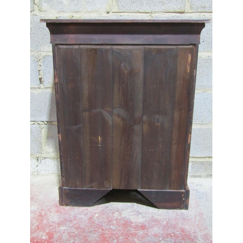 1371 - A Victorian walnut pier cabinet enclosed by a single glazed door with further brass mounts and marqu... 