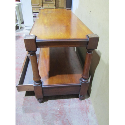 1372 - A Victorian mahogany two tier buffet with turned column supports fitted with two frieze drawers, 130... 