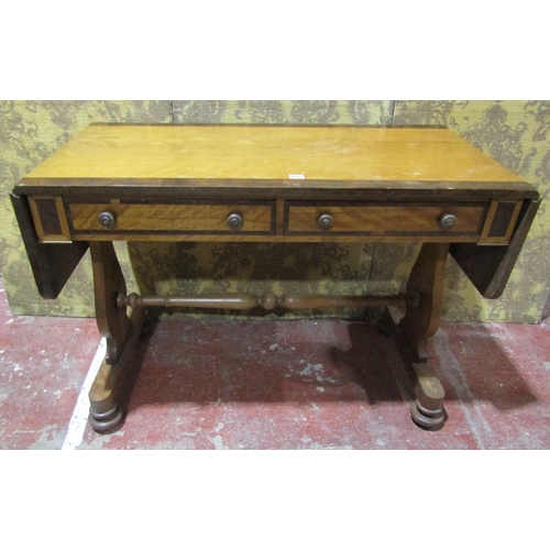 1374 - A Victorian sofa table, cross banded and on stretcher framework.
110cm wide when closed