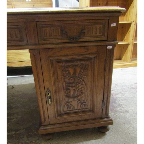 1402 - Late 19th century pedestal oak writing desk to each side three drawers and two cupboards with carved... 