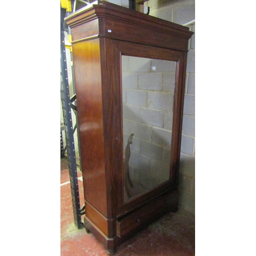 1415 - 19th century mahogany wardrobe with mirror panelled door over a single frieze drawer of knockdown fo... 