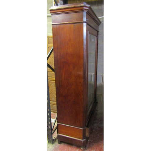 1415 - 19th century mahogany wardrobe with mirror panelled door over a single frieze drawer of knockdown fo... 