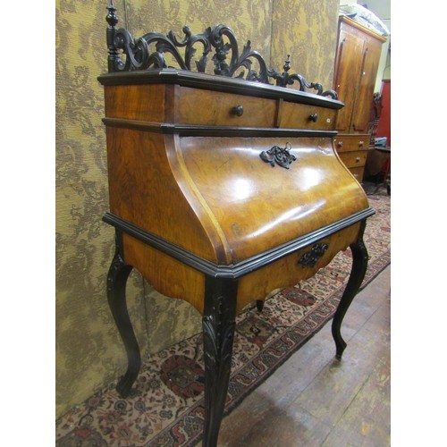 1464 - Mid 19th century figured walnut writing bureau, probably French, the fall flap enclosing a fitted in... 