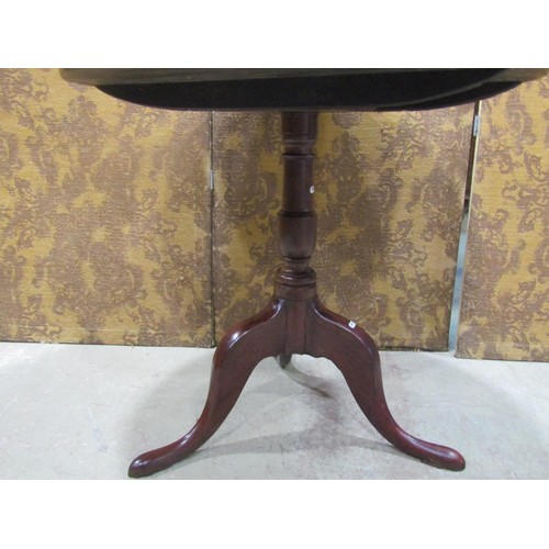 1469 - A large 19th century tripod table with a one piece top, 85cm diameter, 73cm cm high