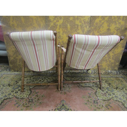 1470 - A pair of Edwardian folding simulated bamboo chairs, with reupholstered finish