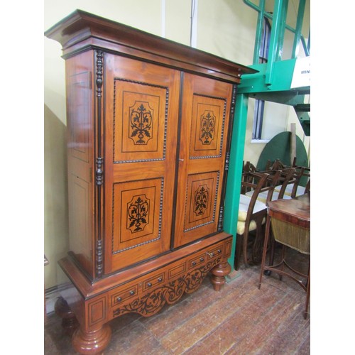 1471 - A good quality colonial hanging cupboard in mahogany and inlaid with ebony, the panelled doors over ... 