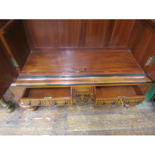 1471 - A good quality colonial hanging cupboard in mahogany and inlaid with ebony, the panelled doors over ... 