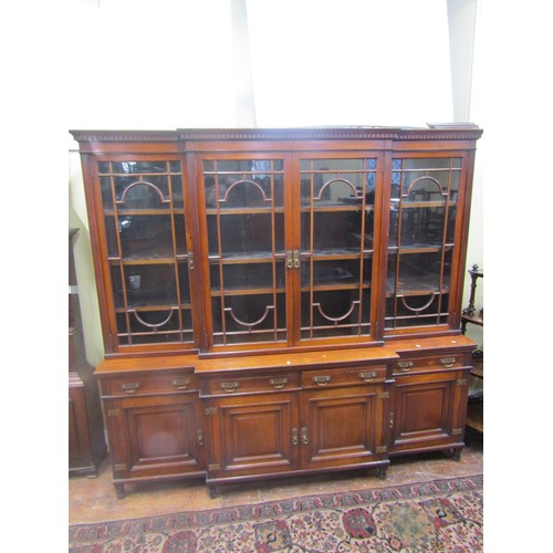 1485 - A good Victorian mahogany breakfront four door bookcase, the lower section enclosed by four panelled... 