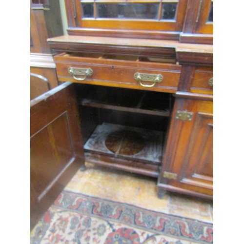 1485 - A good Victorian mahogany breakfront four door bookcase, the lower section enclosed by four panelled... 