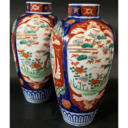 68 - Pair of Imari vases of oviform, further sang de boeuf vase with applied gilded base and cover