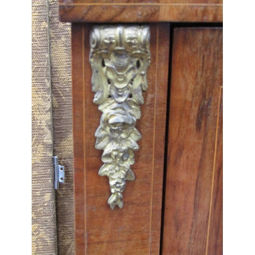 1499 - A 19th century pier cabinet enclosed by a glazed panelled door with applied cast brass fittings on a... 