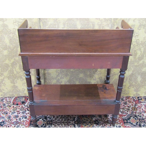 1504 - An early Victorian mahogany washstand raised on turned supports with box base, frieze drawer and rai... 