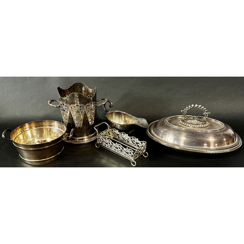 225 - A mixed collection of silver plated items including an ice bucket/ wine cooler, a tureen with remova... 