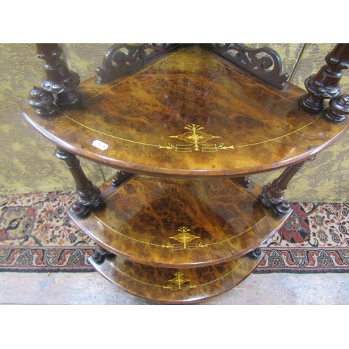 1510 - A Victorian walnut and figured walnut four tier graduated corner whatnot on turned supports, 145cm h... 