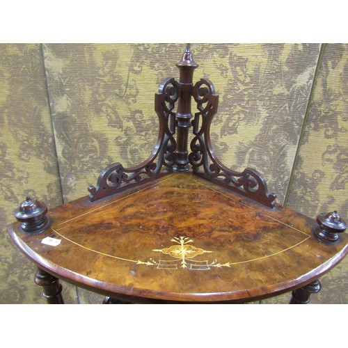 1510 - A Victorian walnut and figured walnut four tier graduated corner whatnot on turned supports, 145cm h... 