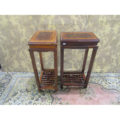 1517 - A pair of Chinese hardwood rectangular side tables, with carved frieze and lattice work under galler... 