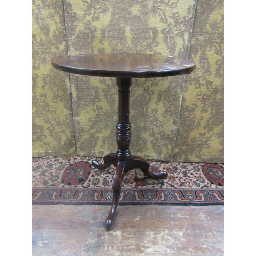 1527 - A Georgian mahogany snap top table with single piece top, raised on a turned pillar and tripod base,... 