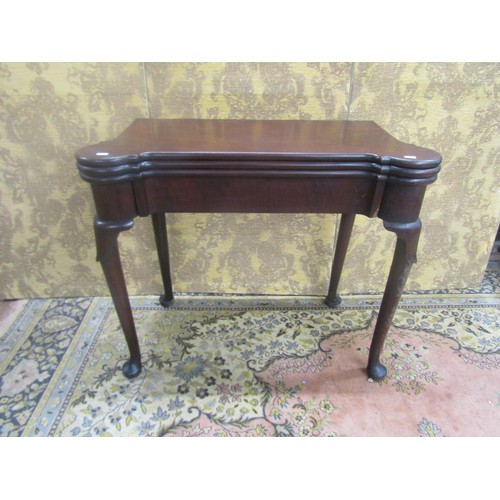 1528 - A good George II mahogany fold over top card and tea table, with turret corners, frieze drawer and r... 