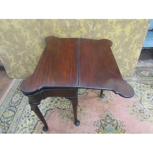 1528 - A good George II mahogany fold over top card and tea table, with turret corners, frieze drawer and r... 