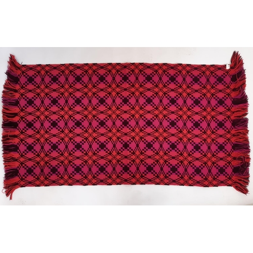 898 - Rug/ travel blanket woven  in the traditional Welsh style with reversible pattern in magenta, coral ... 