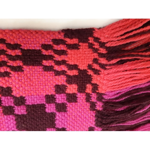 898 - Rug/ travel blanket woven  in the traditional Welsh style with reversible pattern in magenta, coral ... 