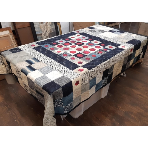 904 - A contemporary hand and machine stitched patchwork quilt with a celestial theme 207 x160cm together ... 