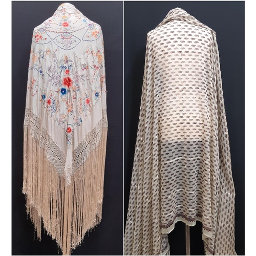 909 - Early 20th century 'Piano' shawl with colourful embroidered flowers and moths on ivory silk ground w... 